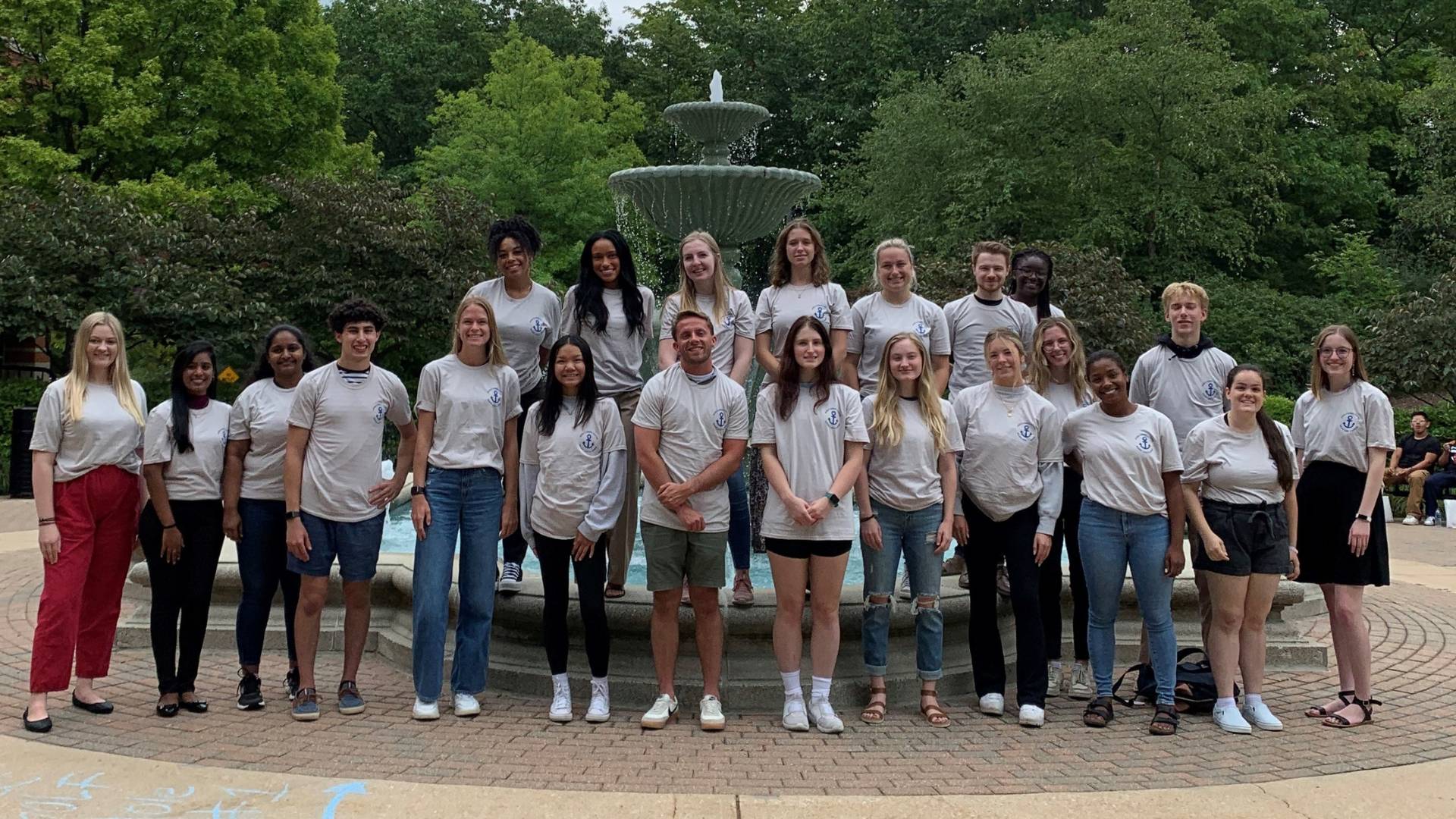 photo of all student staff in front of fountain